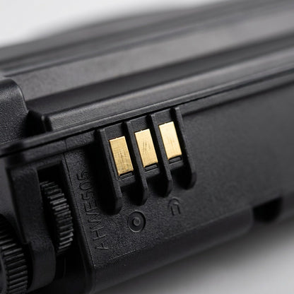 Macro detail of the gold-plated contact points on an Elevate Imaging HP CE505A toner cartridge.