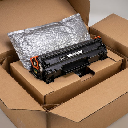 Elevate Imaging HP W1470X compatible toner cartridge securely packed in a protective shipping box.