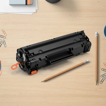 Scale reference of an Elevate Imaging HP CE278A Black Toner cartridge beside two pencils on a desk.