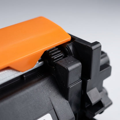 Macro detail of gears and plastic casing on Elevate Imaging HP CF217A compatible black toner.