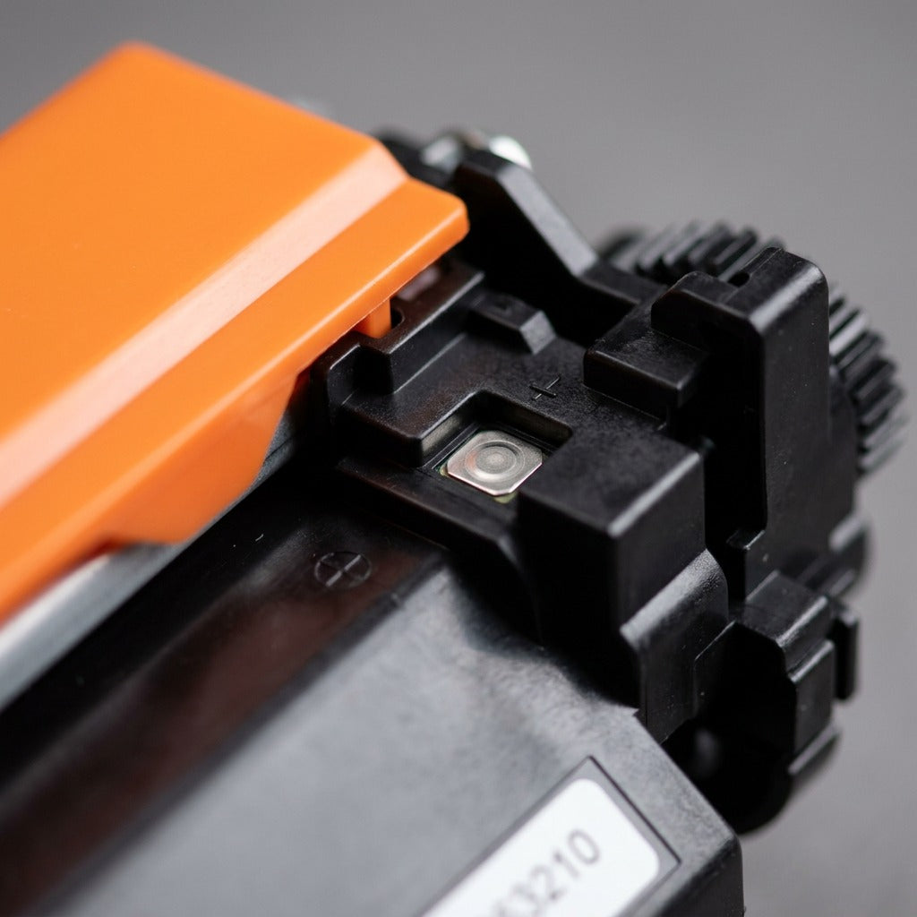 Macro detail of the electrical contact chip on an Elevate Imaging HP 30X (CF230X) toner cartridge.