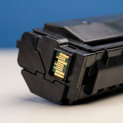Macro detail of the gold-plated smart chip contacts on an Elevate Imaging HP 644A toner cartridge.