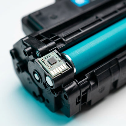 Macro view of the smart chip and cyan developer roller on an Elevate Imaging Q6461A toner cartridge.