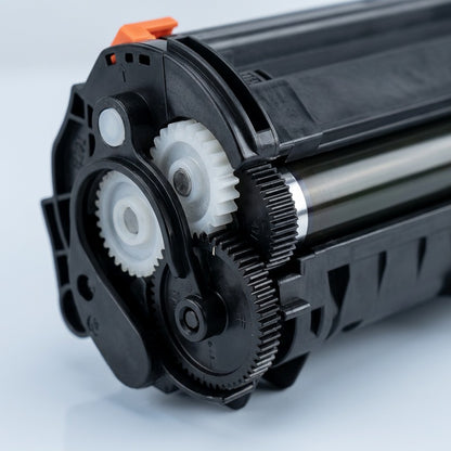 Macro detail of drive gears and developer roller on an Elevate Imaging HP 35A 36A 85A toner.