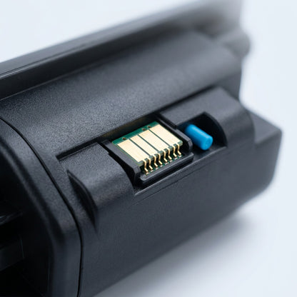 Macro detail of the gold electronic chip on an HP 53A (CC531A) cyan remanufactured toner cartridge.