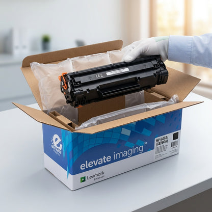 Unboxing the Elevate Imaging HP 647A (CE260A) toner cartridge from secure air cushion packaging.