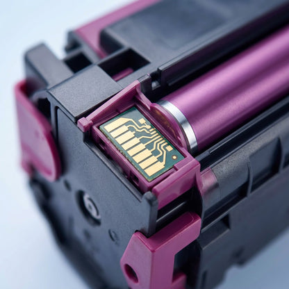 Macro detail of the electrical chip and magenta roller on an HP 648A (CE263A) toner cartridge.
