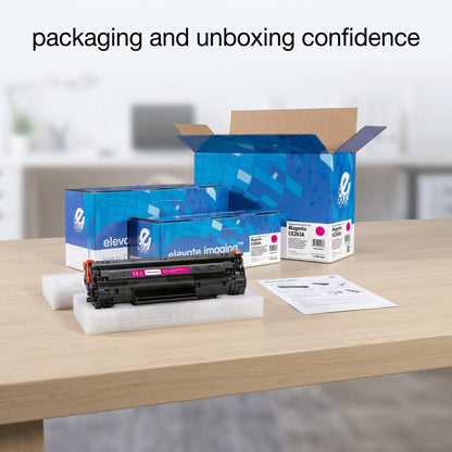 An Elevate Imaging magenta CE263A toner cartridge unboxed on protective foam beside its retail box.