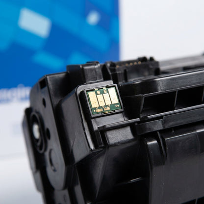 Macro detail of the gold electrical contact chip on an HP 90X CE390X compatible black toner cartridge.