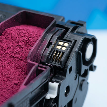 Macro detail of the Elevate Imaging HP 507A Magenta toner hopper and gold contact chip.