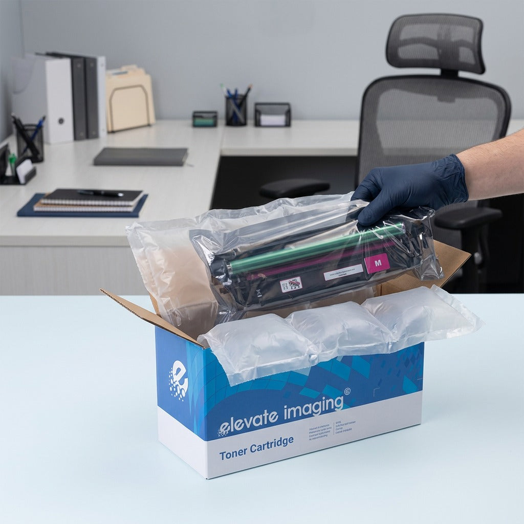 Unboxing an HP 507A Magenta toner cartridge from its Elevate Imaging box with protective packaging.