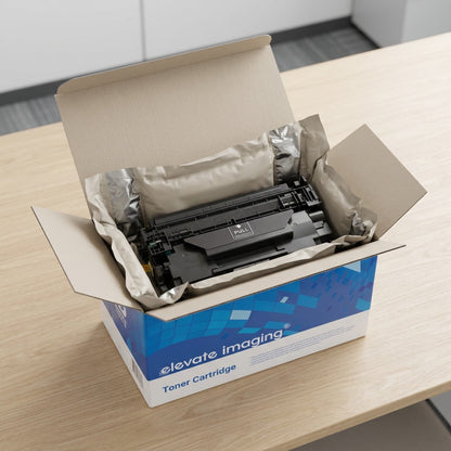 Open Elevate Imaging retail box showing a compatible HP 26X toner cartridge in protective packaging.