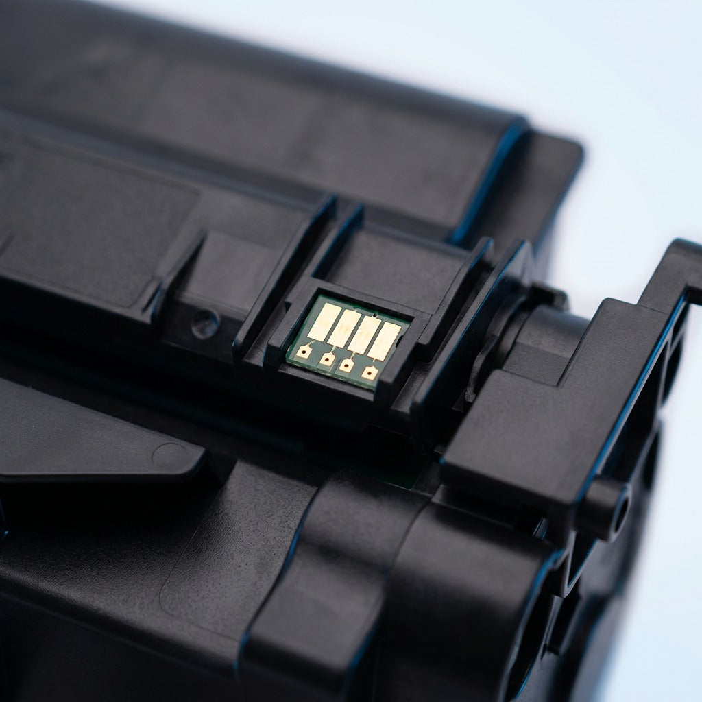 Macro close-up of the gold-plated electrical chip on an Elevate HP 58A CF258A black toner cartridge.