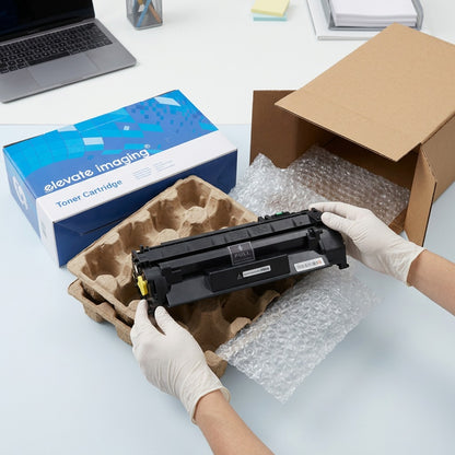Hands unboxing an Elevate Imaging HP 80A (CF280A) compatible toner cartridge from secure packaging.