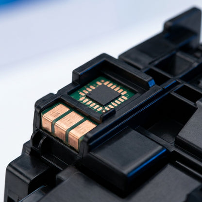 Macro view of the smart chip and copper contacts on an Elevate Imaging compatible HP 87A toner.