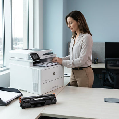 Elevate Imaging Reman HP CF287X toner cartridge on an office desk with a professional LaserJet printer.