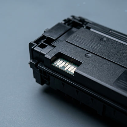 Macro detail of the metallic contact chip on an Elevate Imaging HP 508A (CF360A) black toner cartridge.